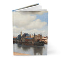 Hardcover journal standing upright showing Johannes Vermeer View of Delft 1660 Dutch Golden Age cityscape oil painting on front cover - LeBonJournal