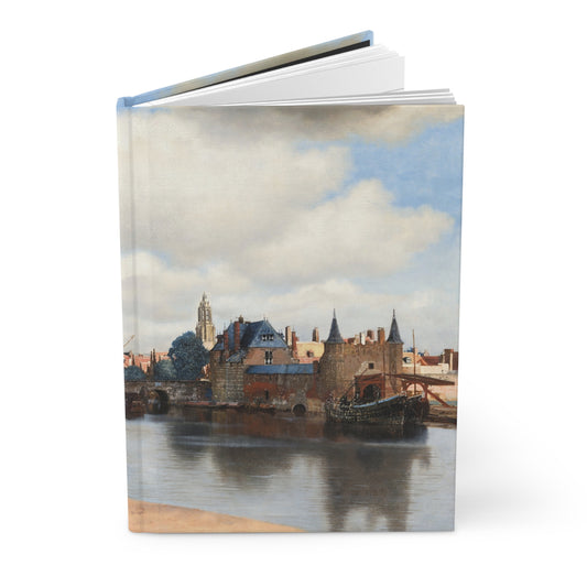 Hardcover journal standing upright showing Johannes Vermeer View of Delft 1660 Dutch Golden Age cityscape oil painting on front cover - LeBonJournal