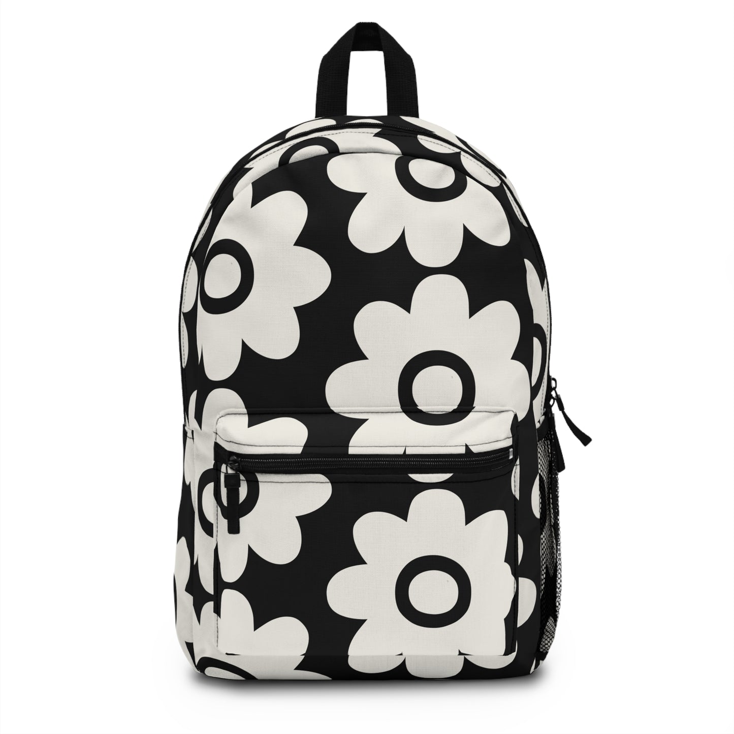 Bold retro daisy backpack black and white floral front view with oversized groovy daisy motifs - LeBonJournal