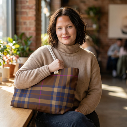 Young woman using brown plaid weekender bag as everyday carry-all tote with autumn tartan pattern - LeBonJournal
