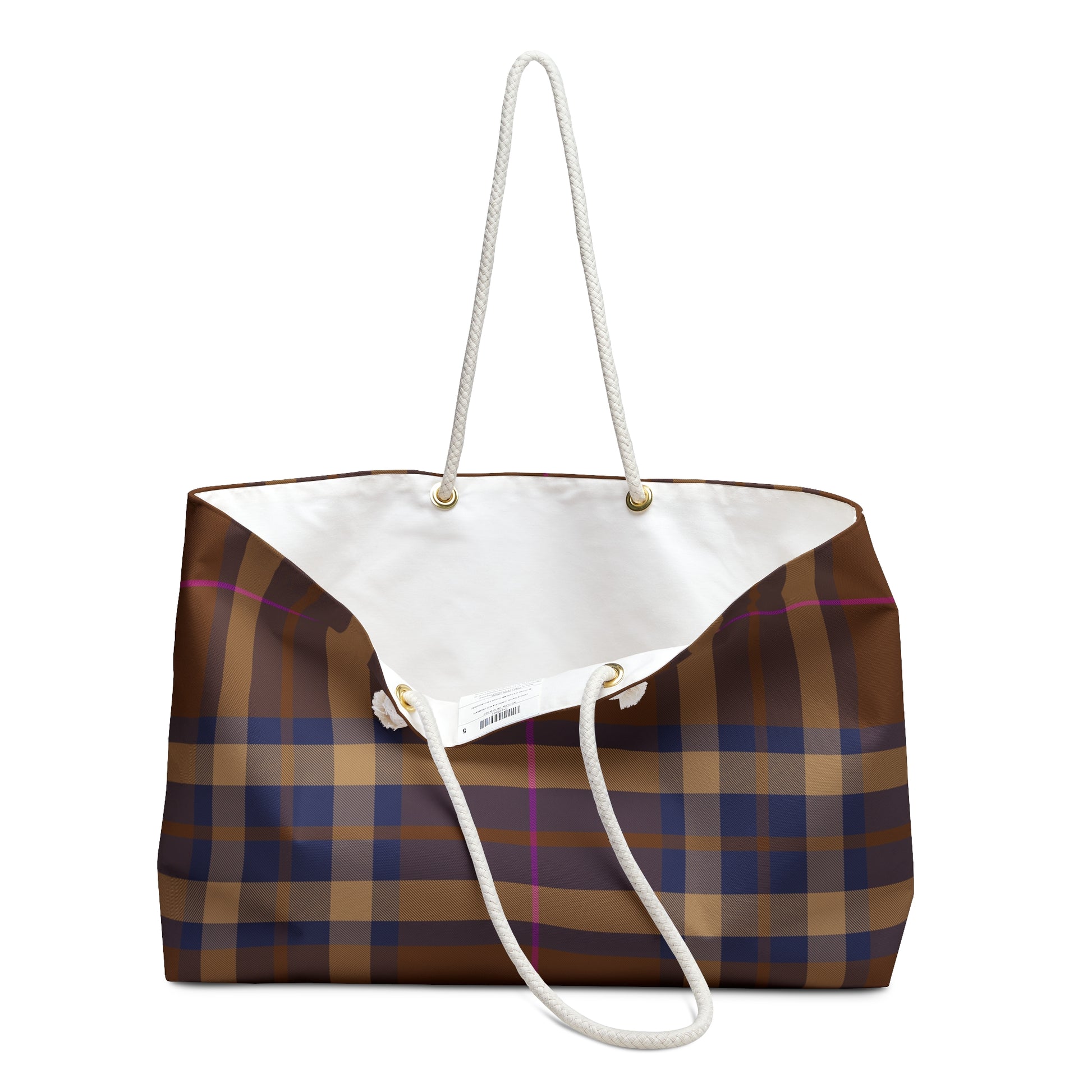 Detail of cream cotton rope handles gold grommets and white cotton-poly interior lining of brown plaid weekender bag - LeBonJournal