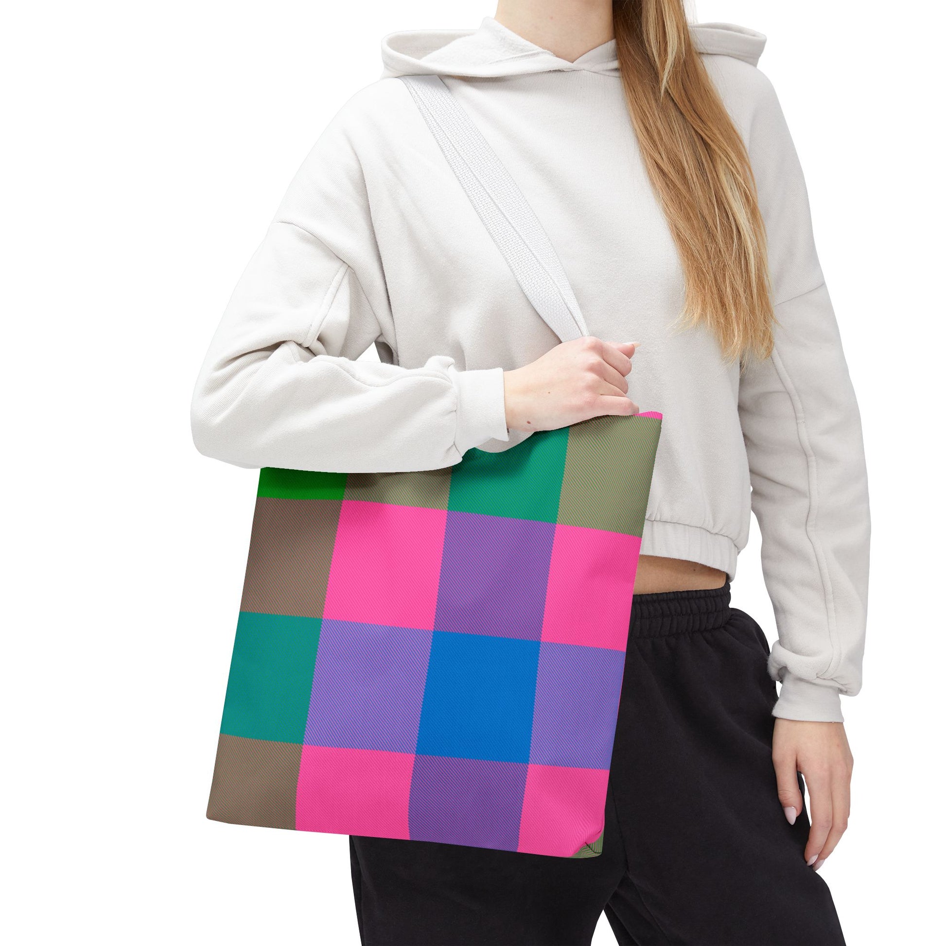 Young woman wearing colorblock check tote bag 16×16 on shoulder with bold stripe design - LeBonJournal