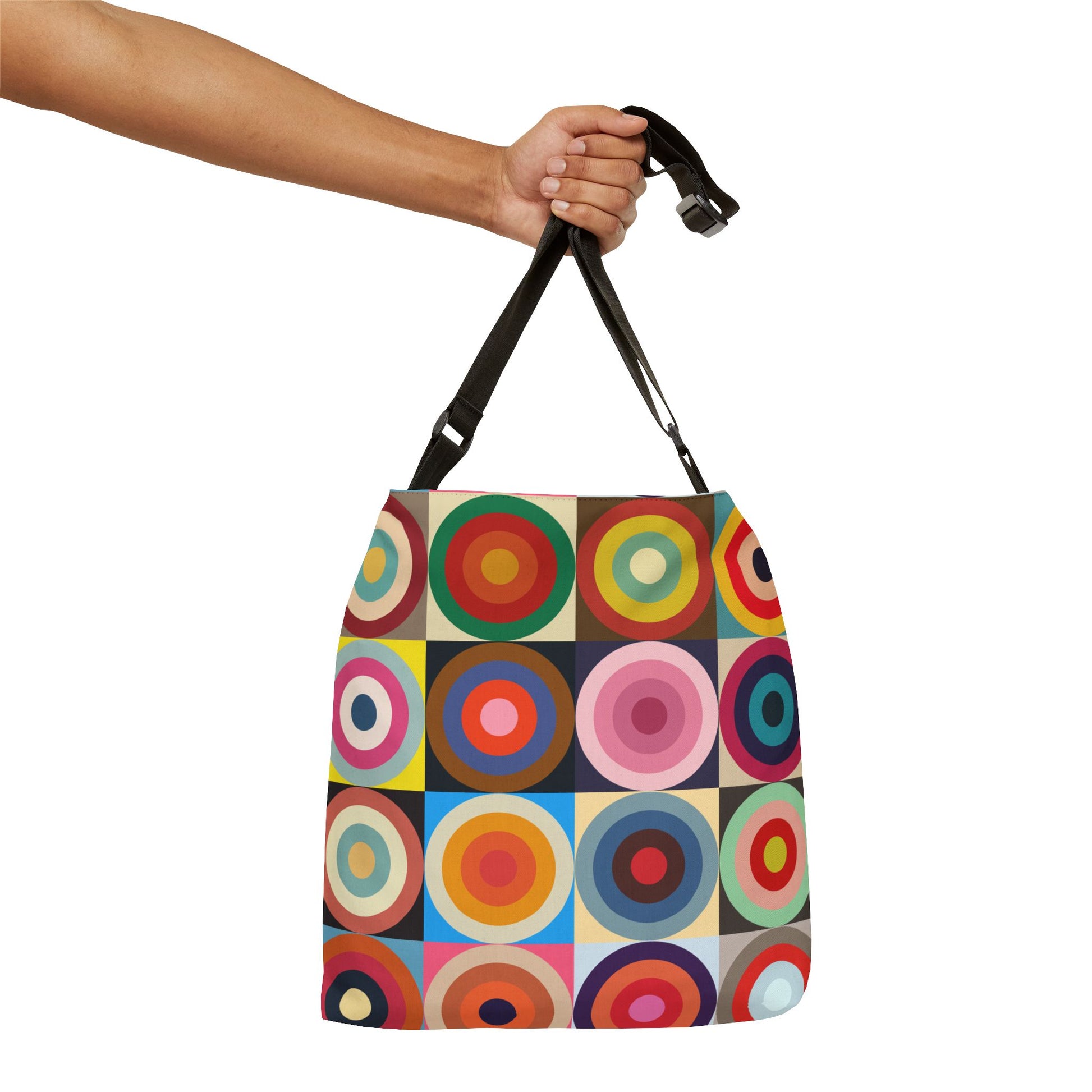 Hand holding colorful retro circles crossbody bag by adjustable strap, multicolor geometric design - LeBonJournal