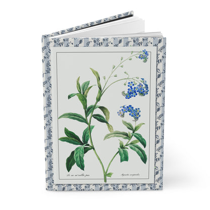 Hardcover forget-me-not journal standing upright showing front cover with Pierre-Joseph Redouté Myosotis scorpioides illustration from La Botanique de J. J. Rousseau featuring delicate blue flowers on matte finish cover - LeBonJournal