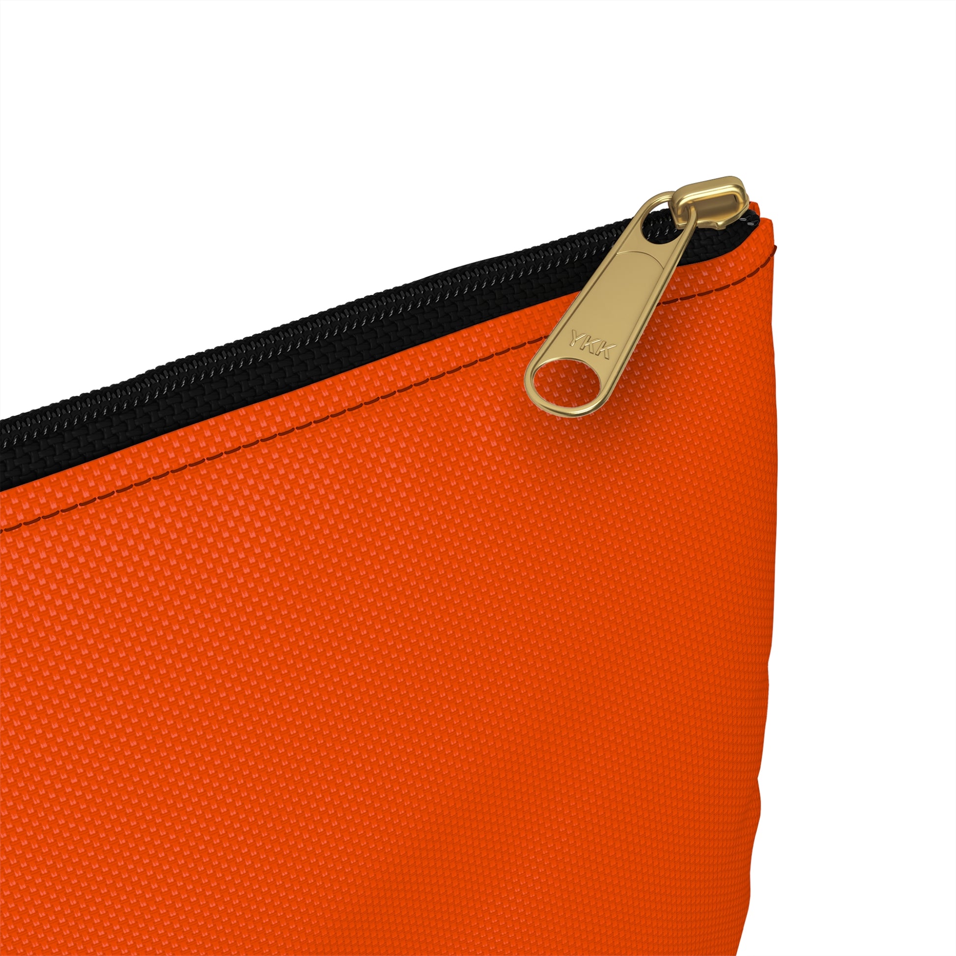 Close-up detail of black zipper and gold puller on orange solid color accessory pouch small size - LeBonJournal