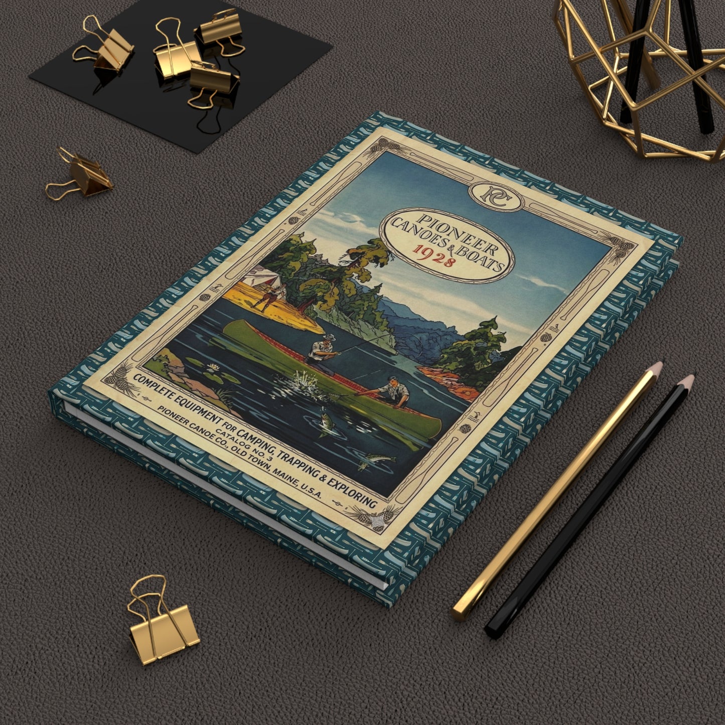 Pioneer 1928 canoe journal on workspace celebrating early 20th-century outdoor adventure - LeBonJournal
