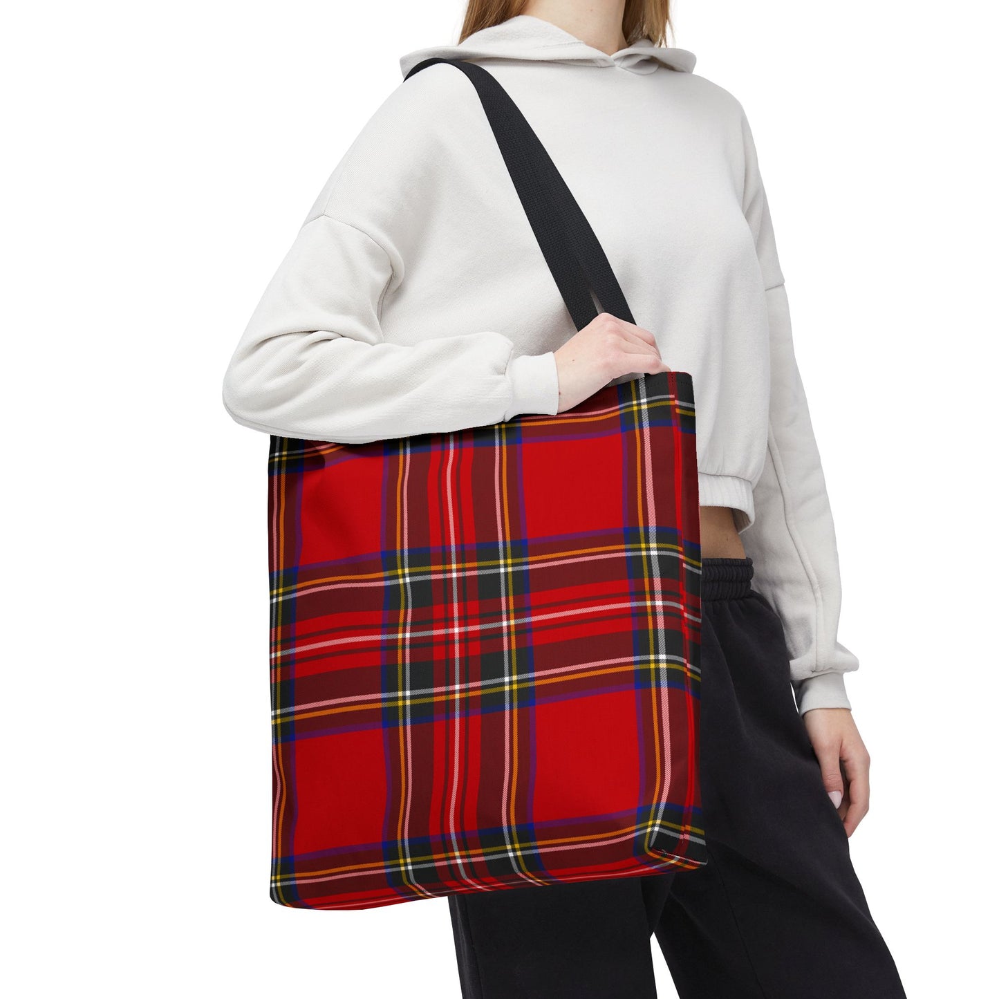 Young woman wearing red tartan tote bag 18×18 on shoulder with Royal Stewart plaid pattern - LeBonJournal