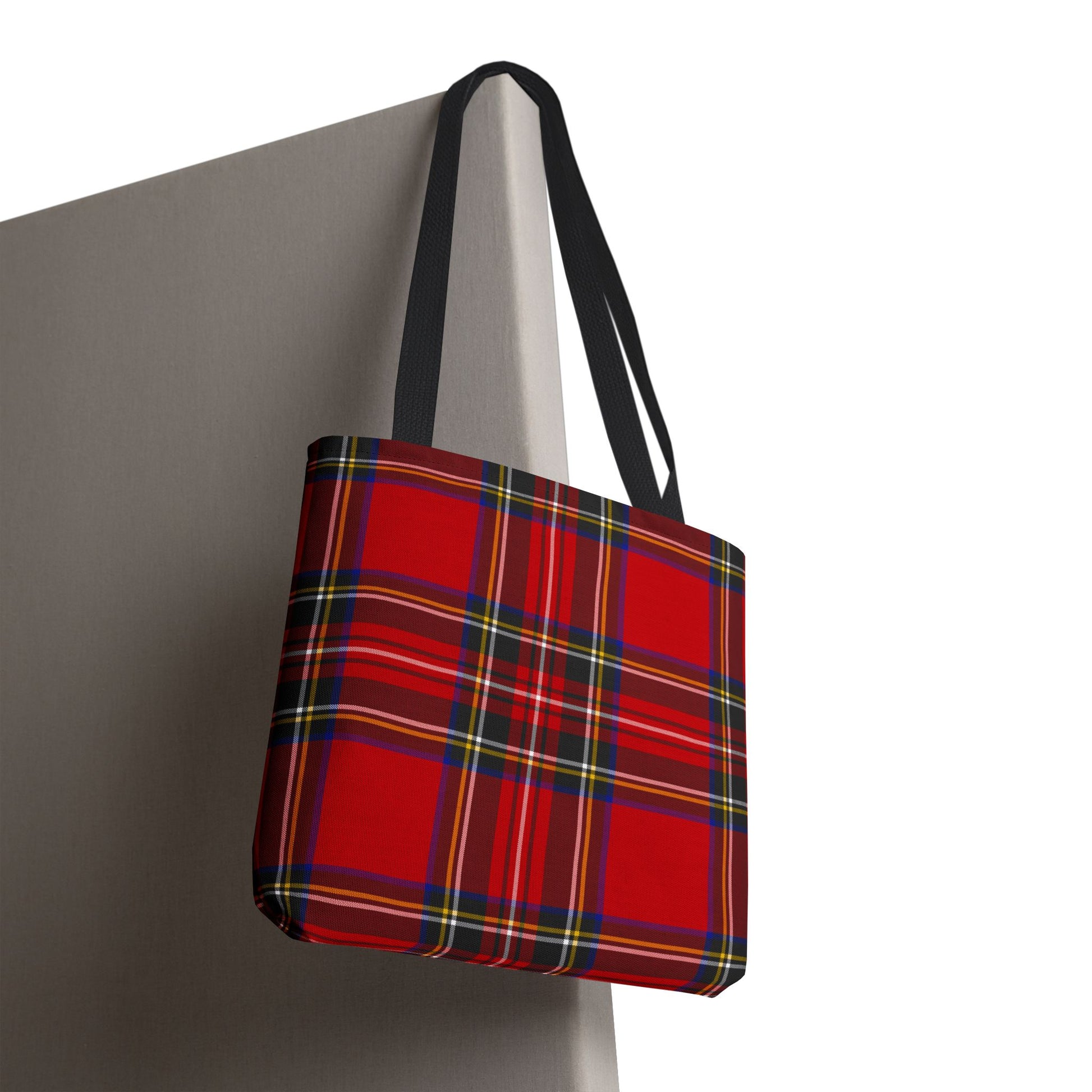 Red tartan tote bag hanging showing full front Royal Stewart plaid pattern and black handles - LeBonJournal