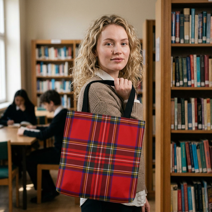 Young woman student carrying red tartan tote bag in public library with Royal Stewart plaid pattern - LeBonJournal
