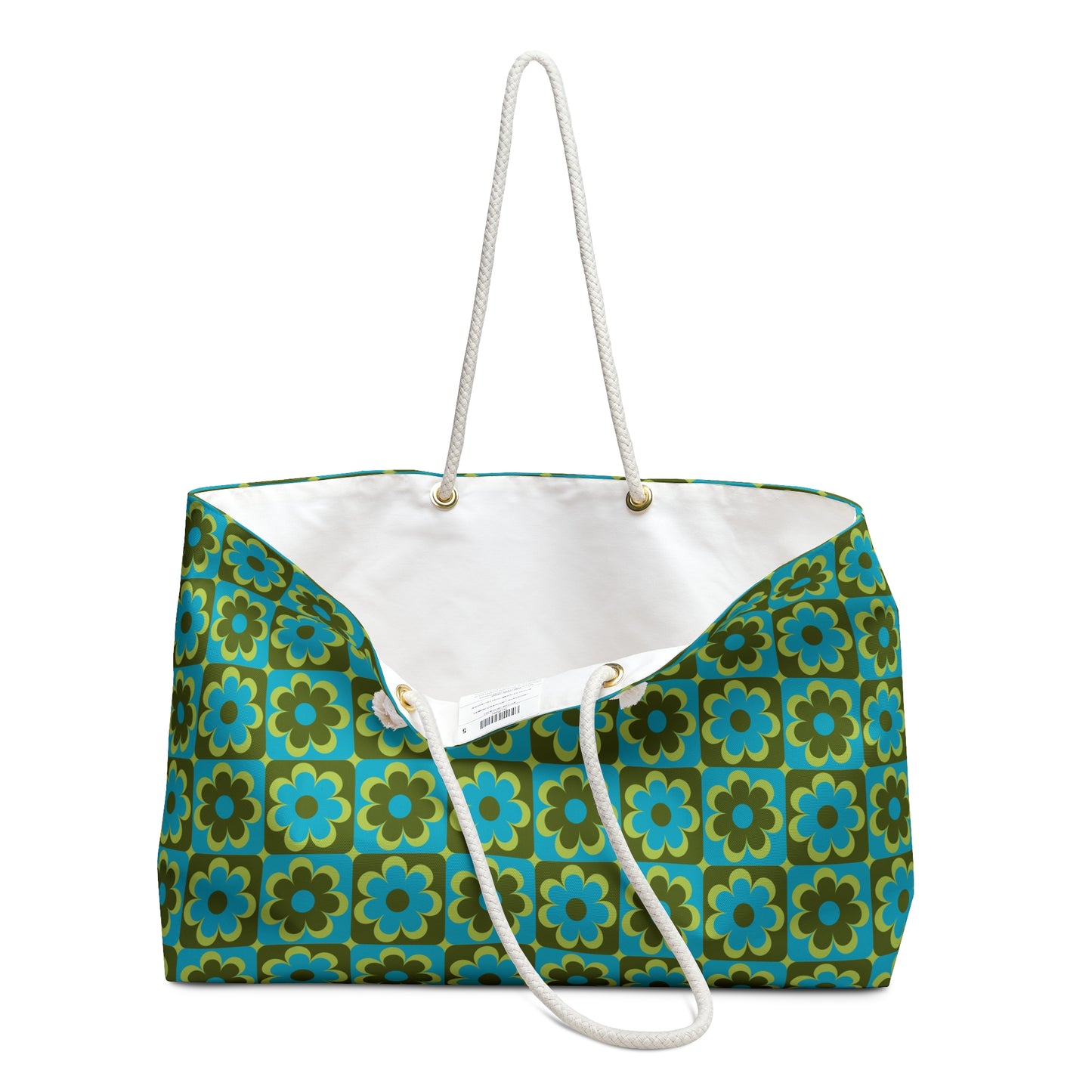 Retro floral weekender bag slightly open showing cream cotton-poly interior lining and structured opening - LeBonJournal