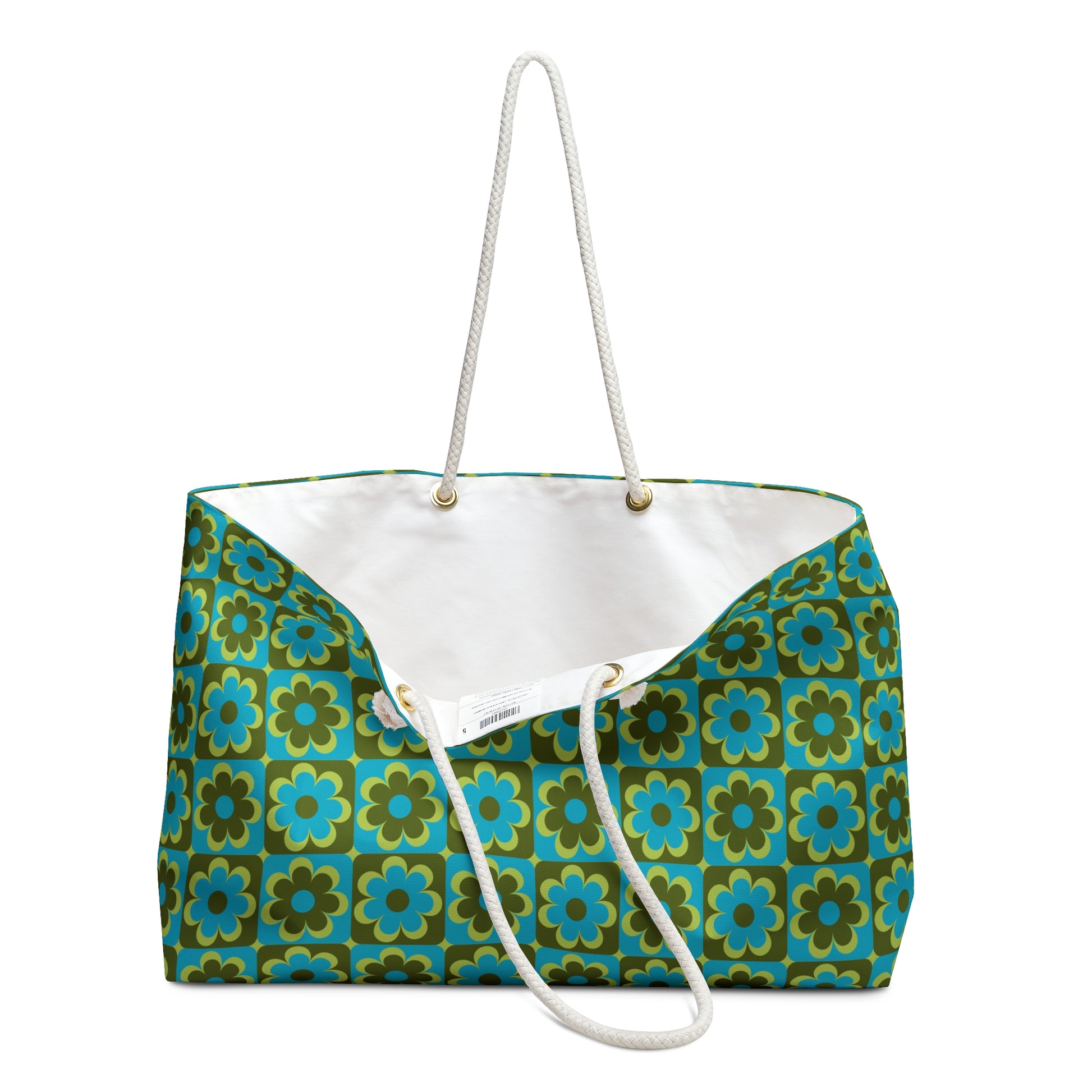 Retro floral weekender bag slightly open showing cream cotton-poly interior lining and structured opening - LeBonJournal