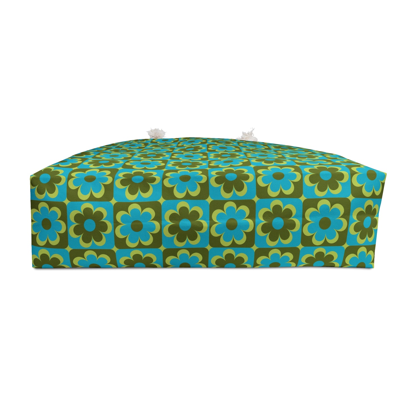 Retro floral weekender bag showing structured T-bottom base in teal olive and cream 70s pop floral pattern - LeBonJournal