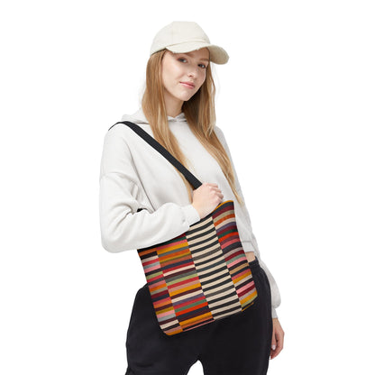 Striped colorblock tote bag 13×13 worn by young woman at outdoor artisan market - LeBonJournal