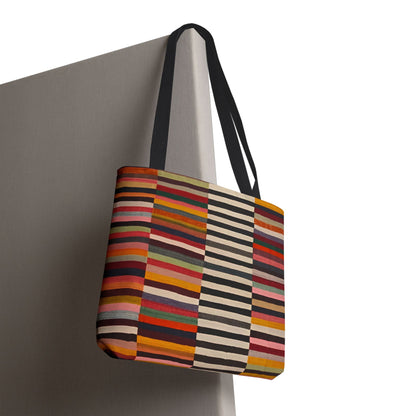 Striped colorblock tote bag hanging, showing full front design and black reinforced handles - LeBonJournal