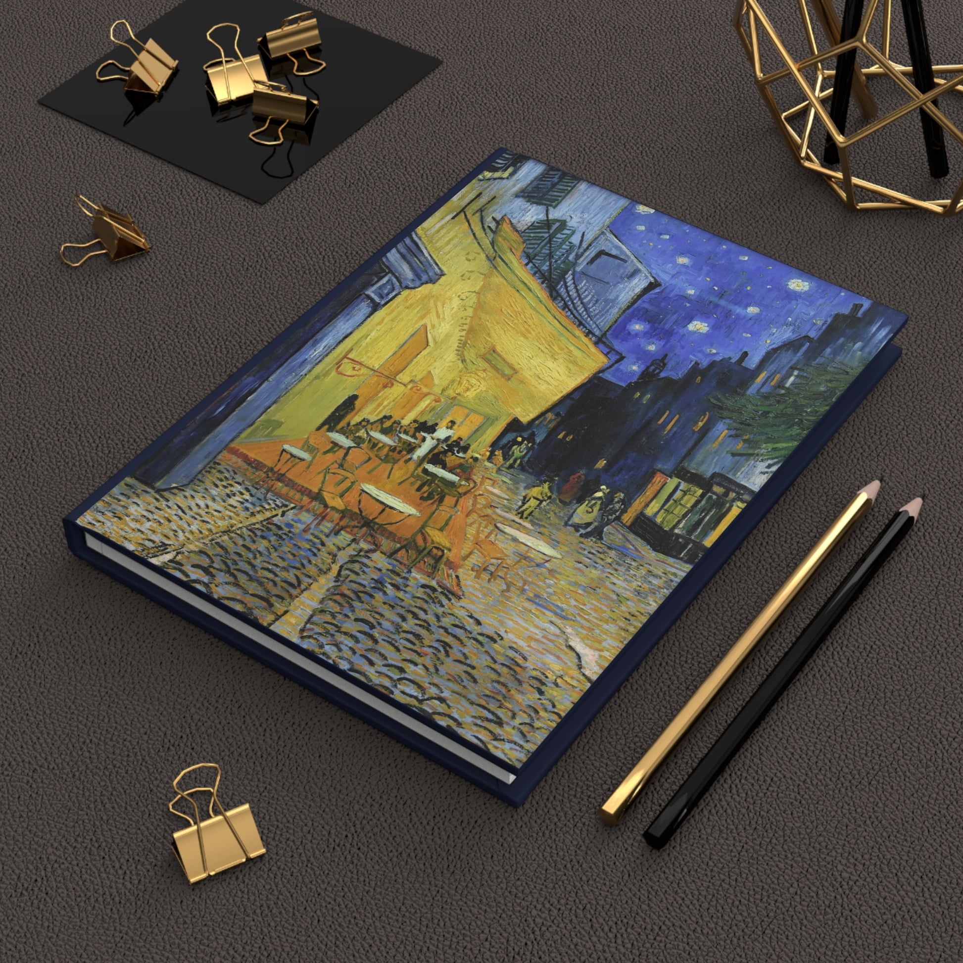 Van Gogh Café Terrace at Night journal on workspace celebrating 1888 Arles Post-Impressionist legacy - LeBonJournal
