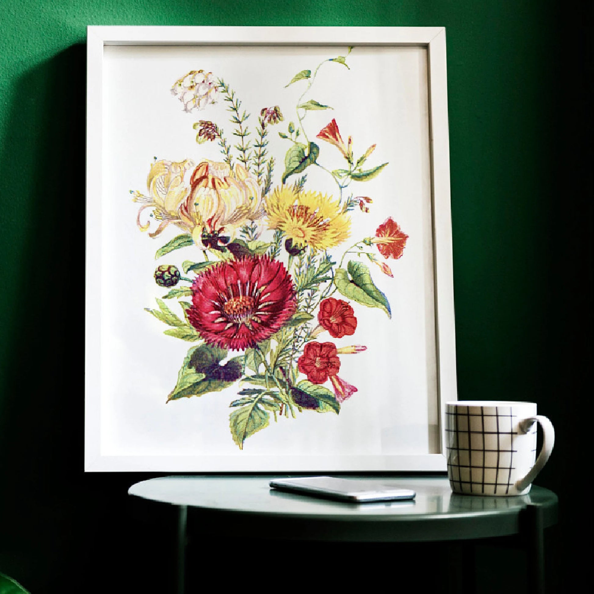 Framed Victorian floral illustration on table with coffee cup and phone in elegant home decor - LeBonJournal