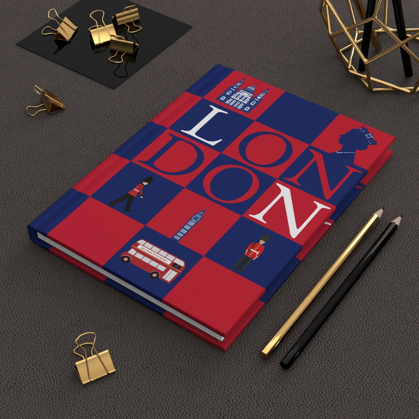 London travel journal on desk with gold clips for UK trip planning - LeBonJournal