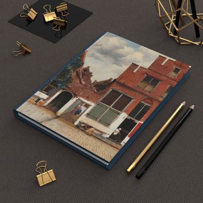 Vermeer Delft views journal on desk with gold clips for art and travel notes - LeBonJournal
