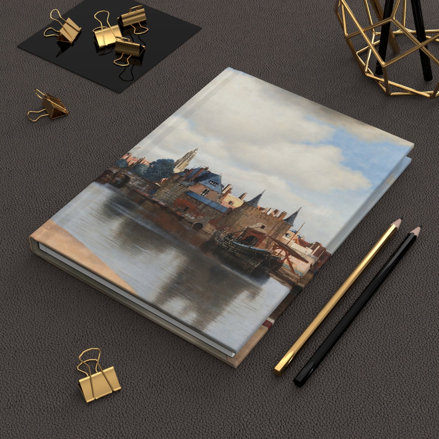 Lifestyle photo of Vermeer View of Delft journal styled for art lovers Dutch history enthusiasts and Golden Age admirers - LeBonJournal