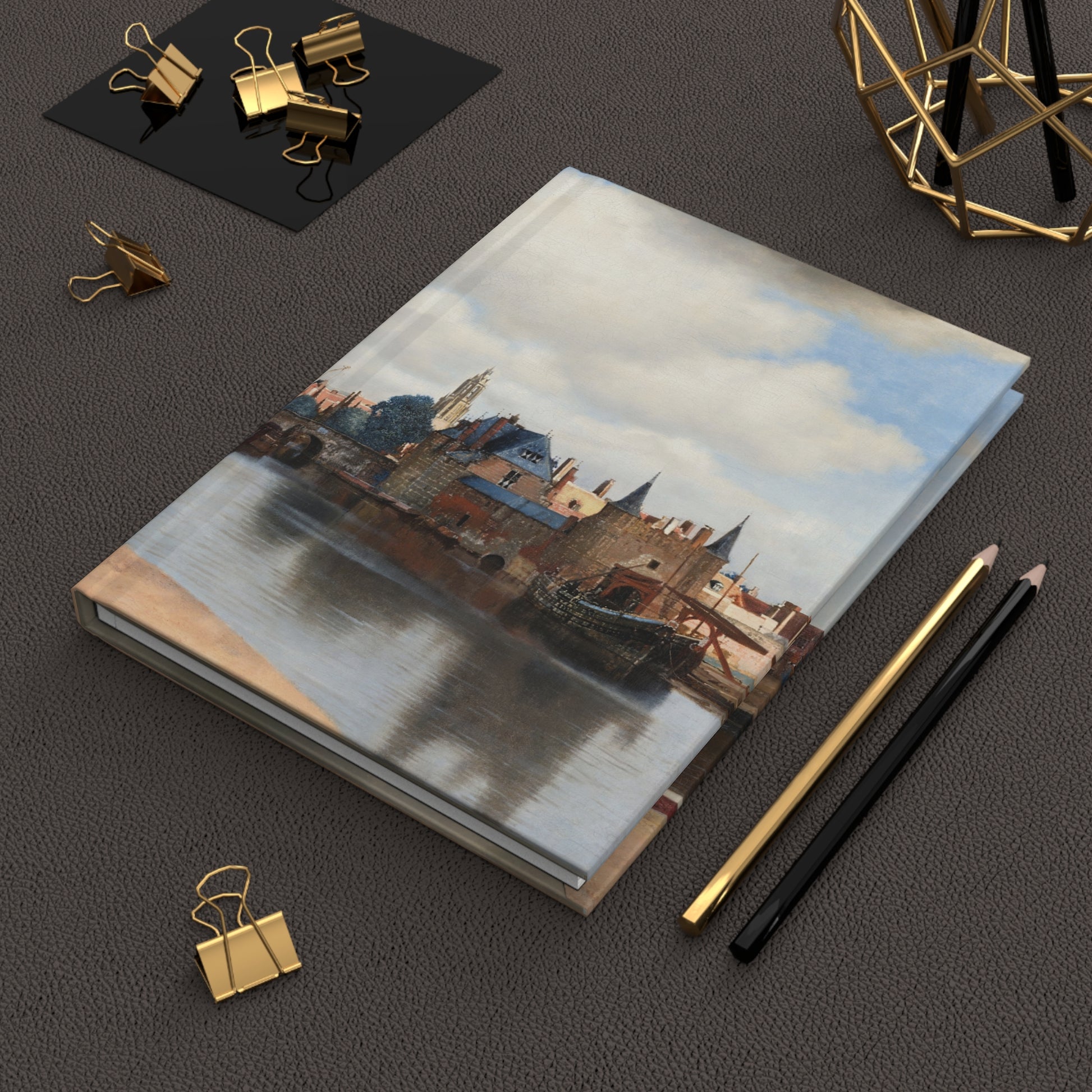 Lifestyle photo of Vermeer View of Delft journal styled for art lovers Dutch history enthusiasts and Golden Age admirers - LeBonJournal